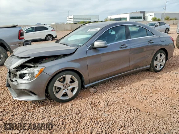 ✅ 2018 Mercedes-Benz CLA 250 • VIN: WDDSJ4EB0JN696070 • Лот: 98453935. Опубликован ранее на Copart с пробегом 57 174 миль. Бесплатный доступ к архиву аукционных продаж из США и подробный отчёт об истории автомобиля на DreamBid. Изображение 1.