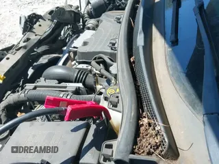 2018 Chevrolet Cruze LT z VIN 1G1BE5SM4J7168300, wystawiony jako IAAI lot #43374665 z przebiegiem 148 848 mil mil oraz . Historia ofert i sprzedaży dostępna na DreamBid. Obrazek 20.