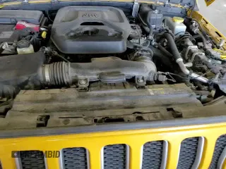 ✅ 2019 Jeep Wrangler Unlimited Sahara • VIN: 1C4HJXEN0KW625558 • Лот: 81084865. Опубликован ранее на Copart с пробегом 129 282 миль. Бесплатный доступ к архиву аукционных продаж из США и подробный отчёт об истории автомобиля на DreamBid. Изображение 14.