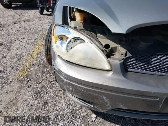 ✅ 2004 Ford Taurus SES • VIN: 1FAFP55S04A114454 • Лот: 44522086. Опубліковано раніше на IAAI з пробігом 200 000 миль. Безкоштовний доступ до архіву аукціонних продажів зі США та докладний звіт про історію автомобіля на DreamBid. Зображення 6.