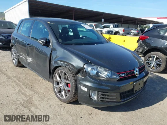 ✅ 2014 Volkswagen Golf GTI Wolfsburg Edition • VIN: WVWGD7AJ2EW003490 • Lot: 44775696. Listed on IAAI with 58,907 mi. Free auction sales archive from the USA and detailed vehicle history report at DreamBid. Image 1.