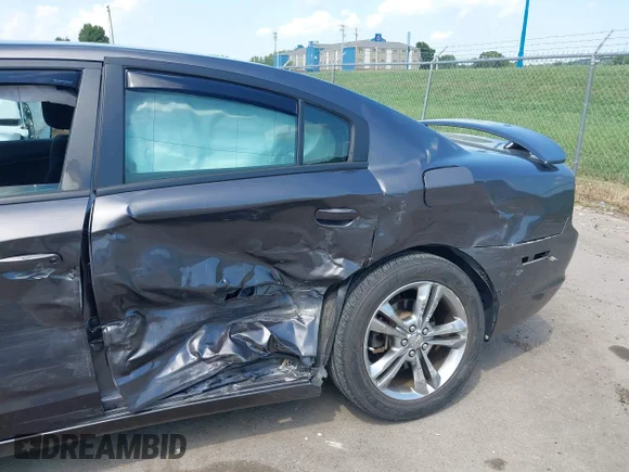 ✅ 2014 Dodge Charger SXT • VIN: 2C3CDXJG8EH104684 • Лот: 43003507. Опубліковано раніше на IAAI з пробігом 70 173 миль. Безкоштовний доступ до архіву аукціонних продажів зі США та докладний звіт про історію автомобіля на DreamBid. Зображення 6.