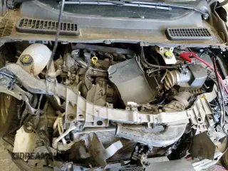 ✅ 2018 Ford Escape S • VIN: 1FMCU0F7XJUB25504 • Lot: 82400425. Listed on Copart with 133,945 mi. Free auction sales archive from the USA and detailed vehicle history report at DreamBid. Image 17.