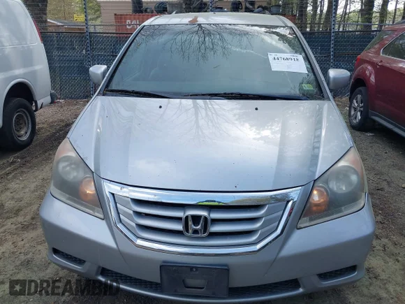 ✅ 2010 Honda Odyssey EX • VIN: 5FNRL3H44AB095530 • Лот: 44768918. Опубліковано раніше на IAAI з пробігом 214 490 миль. Безкоштовний доступ до архіву аукціонних продажів зі США та докладний звіт про історію автомобіля на DreamBid. Зображення 6.