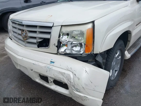 ✅ 2005 Cadillac Escalade • VIN: 1GYEK63N65R161945 • Лот: 43059472. Опубликован ранее на IAAI с пробегом 217 874 миль. Бесплатный доступ к архиву аукционных продаж из США и подробный отчёт об истории автомобиля на DreamBid. Изображение 6.