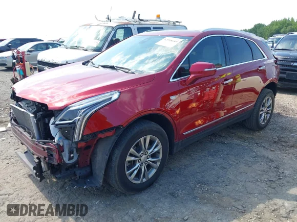 ✅ 2021 Cadillac XT5 FWD Premium Luxury • VIN: 1GYKNCRS6MZ214082 • Лот: 42558689. Опубліковано раніше на IAAI з пробігом 51 855 миль. Безкоштовний доступ до архіву аукціонних продажів зі США та докладний звіт про історію автомобіля на DreamBid. Зображення 2.