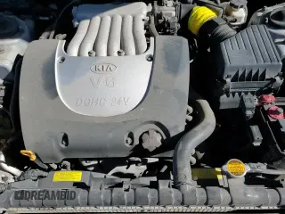 ✅ 2006 Kia Optima LX • VIN: KNAGD128565443202 • Лот: 86079074. Опубликован ранее на Copart с пробегом 77 684 миль. Бесплатный доступ к архиву аукционных продаж из США и подробный отчёт об истории автомобиля на DreamBid. Изображение 13.