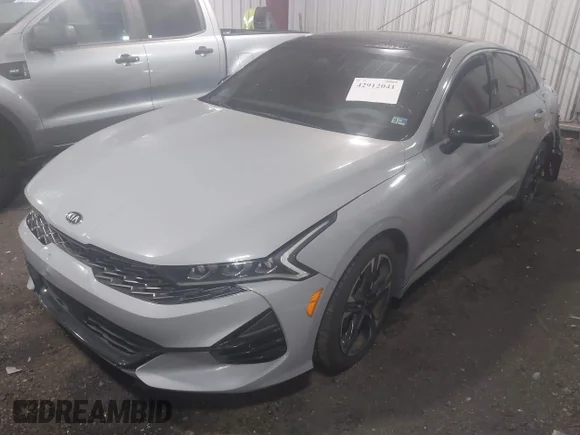 ✅ 2021 Kia K5 GT-Line • VIN: 5XXG64J28MG063047 • Лот: 42912041. Опубліковано раніше на IAAI з пробігом 63 274 миль. Безкоштовний доступ до архіву аукціонних продажів зі США та докладний звіт про історію автомобіля на DreamBid. Зображення 2.