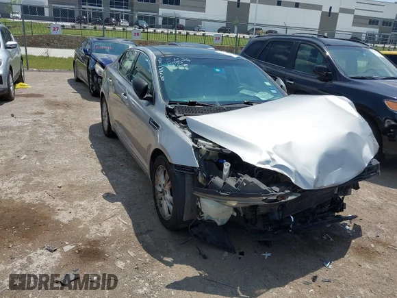 ✅ 2011 Kia Optima EX • VIN: KNAGN4A75B5172739 • Лот: 45180030. Опубліковано раніше на IAAI з пробігом 170 932 миль. Безкоштовний доступ до архіву аукціонних продажів зі США та докладний звіт про історію автомобіля на DreamBid. Зображення 1.