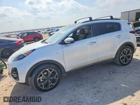 ✅ 2022 Kia Sportage SX Turbo • VIN: KNDPRCA60N7979767 • Lot: 76828835. Listed on Copart with 127,823 mi. Free auction sales archive from the USA and detailed vehicle history report at DreamBid. Image 1.