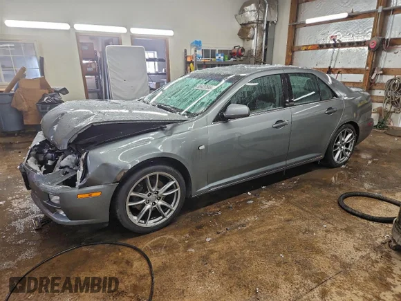 ✅ 2006 Cadillac STS • VIN: 1G6DC67A060116210 • Lot: 95427565. Wystawiony na Copart z przebiegiem 141 705 mil. Bezpłatny archiwum sprzedaży aukcyjnych z USA i szczegółowy raport historii pojazdu na DreamBid. Zdjęcie 1.