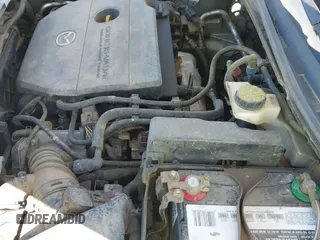 ✅ 2008 Mazda 3 i Touring Value • VIN: JM1BK32F481135039 • Lot: 43184670. Listed on IAAI with 118,301 mi. Free auction sales archive from the USA and detailed vehicle history report at DreamBid. Image 12.