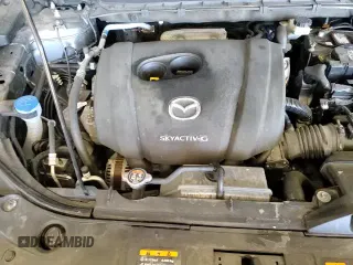 ✅ 2022 Mazda CX-5 S Premium Plus • VIN: JM3KFBEM4N1616470 • Лот: 84722385. Опубликован ранее на Copart с пробегом 53 321 миль. Бесплатный доступ к архиву аукционных продаж из США и подробный отчёт об истории автомобиля на DreamBid. Изображение 16.