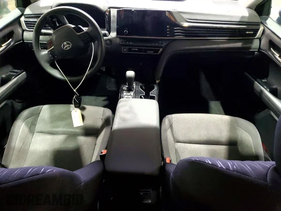 ✅ 2025 Toyota Camry LE • VIN: 4T1DAACKXSU006283 • Лот: 47055276. Опубликован ранее на Copart с пробегом 57 307 миль. Бесплатный доступ к архиву аукционных продаж из США и подробный отчёт об истории автомобиля на DreamBid. Изображение 8.