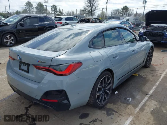 ✅ 2024 BMW i4 M50 • VIN: WBY33AW0XRFS38674 • Лот: 41716132. Опубліковано раніше на IAAI з пробігом 11 507 миль. Безкоштовний доступ до архіву аукціонних продажів зі США та докладний звіт про історію автомобіля на DreamBid. Зображення 4.
