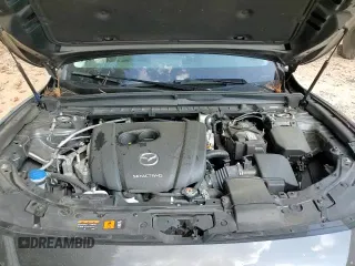 ✅ 2023 Mazda CX-50 S Preferred Plus • VIN: 7MMVABCM5PN147022 • Lot: 82095875. Listed on Copart with 44,705 mi. Free auction sales archive from the USA and detailed vehicle history report at DreamBid. Image 16.