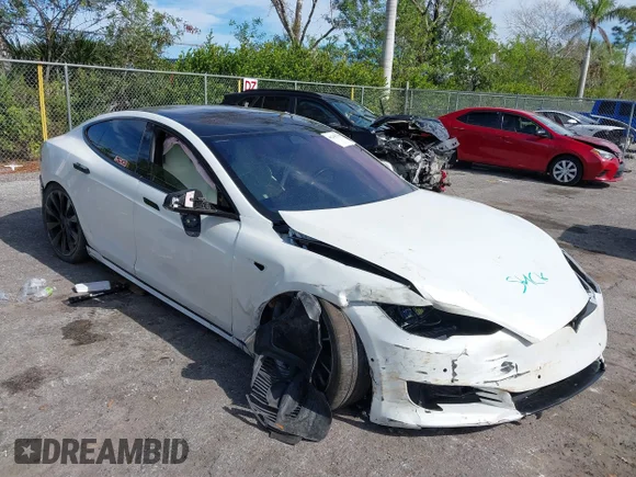 ✅ 2020 Tesla Model S Long Range • VIN: 5YJSA1E2XLF360260 • Lot: 41241778. Listed on IAAI with 141,594 mi. Free auction sales archive from the USA and detailed vehicle history report at DreamBid. Image 1.