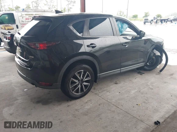✅ 2018 Mazda CX-5 Touring • VIN: JM3KFACM3J1454421 • Lot: 45331003. Wystawiony na IAAI z przebiegiem 113 258 mil. Bezpłatny archiwum sprzedaży aukcyjnych z USA i szczegółowy raport historii pojazdu na DreamBid. Zdjęcie 4.