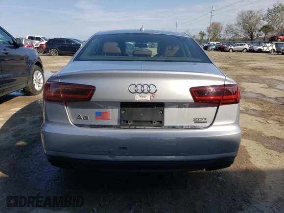 ✅ 2016 Audi A6 Premium Plus • VIN: WAUGFAFC0GN043140 • Лот: 38285893. Опубліковано раніше на Copart з пробігом 103 688 миль. Безкоштовний доступ до архіву аукціонних продажів зі США та докладний звіт про історію автомобіля на DreamBid. Зображення 6.
