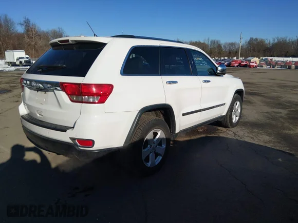 ✅ 2013 Jeep Grand Cherokee Laredo • VIN: 1C4RJFAG2DC592296 • Lot: 44220469. Listed on IAAI with 100,191 mi. Free auction sales archive from the USA and detailed vehicle history report at DreamBid. Image 4.