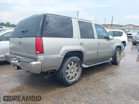 ✅ 2000 Cadillac Escalade • VIN: 1GYEK63RXYR210393 • Lot: 42836625. Wystawiony na IAAI z przebiegiem 242 451 mil. Bezpłatny archiwum sprzedaży aukcyjnych z USA i szczegółowy raport historii pojazdu na DreamBid. Zdjęcie 4.
