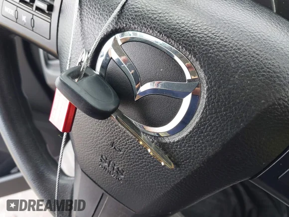 ✅ 2014 Mazda 5 Sport • VIN: JM1CW2BLXE0163261 • Лот: 41968929. Опубліковано раніше на IAAI з пробігом 149 215 миль. Безкоштовний доступ до архіву аукціонних продажів зі США та докладний звіт про історію автомобіля на DreamBid. Зображення 11.