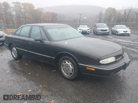 ✅ 1997 Oldsmobile 88 LSS - 1SA • VIN: 1G3HY52K7V4834984 • Лот: 43580456. Опубликован ранее на IAAI с пробегом 82 356 миль. Бесплатный доступ к архиву аукционных продаж из США и подробный отчёт об истории автомобиля на DreamBid. Изображение 1.