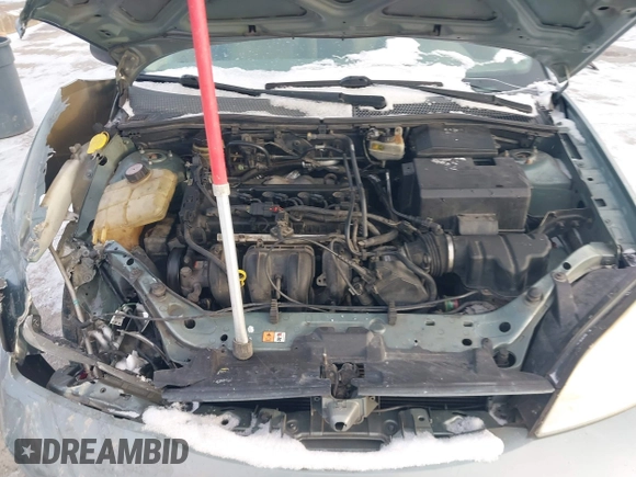 ✅ 2005 Ford Focus S • VIN: 1FAFP34N75W209811 • Lot: 43890964. Wystawiony na IAAI z przebiegiem 268 865 mil. Bezpłatny archiwum sprzedaży aukcyjnych z USA i szczegółowy raport historii pojazdu na DreamBid. Zdjęcie 10.