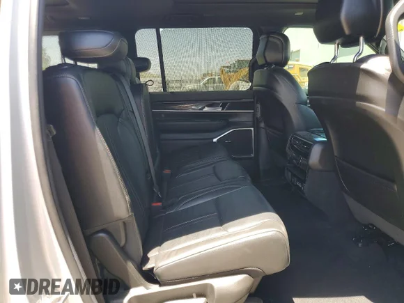 ✅ 2022 Jeep Wagoneer Series I • VIN: 1C4SJVAT3NS212771 • Лот: 56855306. Опубліковано раніше на Copart з пробігом 63 900 миль. Безкоштовний доступ до архіву аукціонних продажів зі США та докладний звіт про історію автомобіля на DreamBid. Зображення 11.