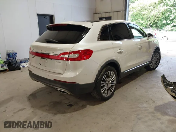 ✅ 2018 Lincoln MKX Reserve • VIN: 2LMPJ8LR8JBL13768 • Lot: 42724761. Listed on IAAI with 81,067 mi. Free auction sales archive from the USA and detailed vehicle history report at DreamBid. Image 4.