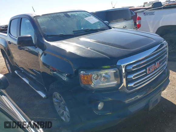 ✅ 2015 GMC Canyon 4WD SLE • VIN: 1GTG6BE30F1176688 • Lot: 43570805. Listed on IAAI with 130,837 mi. Free auction sales archive from the USA and detailed vehicle history report at DreamBid. Image 1.