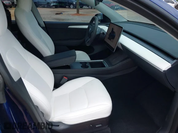 ✅ 2023 Tesla Model Y Long Range • VIN: 7SAYGDEE3PF702211 • Lot: 45112737. Wystawiony na IAAI z przebiegiem 25 474 mil. Bezpłatny archiwum sprzedaży aukcyjnych z USA i szczegółowy raport historii pojazdu na DreamBid. Zdjęcie 5.