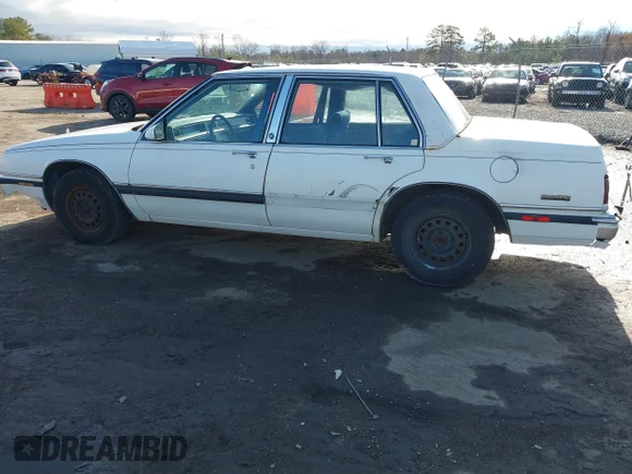 ✅ 1990 Buick LeSabre • VIN: 1G4HR54C8LH407074 • Лот: 41734346. Опубліковано раніше на IAAI з пробігом 203 115 миль. Безкоштовний доступ до архіву аукціонних продажів зі США та докладний звіт про історію автомобіля на DreamBid. Зображення 6.
