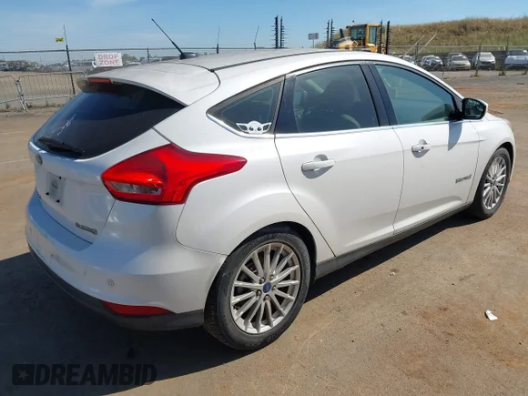 ✅ 2015 Ford Focus Electric • VIN: 1FADP3R45FL386254 • Lot: 45103572. Listed on IAAI with 75,823 mi. Free auction sales archive from the USA and detailed vehicle history report at DreamBid. Image 4.