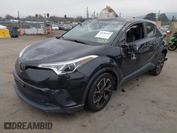 ✅ 2019 Toyota C-HR LE • VIN: JTNKHMBX6K1018885 • Lot: 44198411. Wystawiony na IAAI z przebiegiem 106 110 mil. Bezpłatny archiwum sprzedaży aukcyjnych z USA i szczegółowy raport historii pojazdu na DreamBid. Zdjęcie 2.