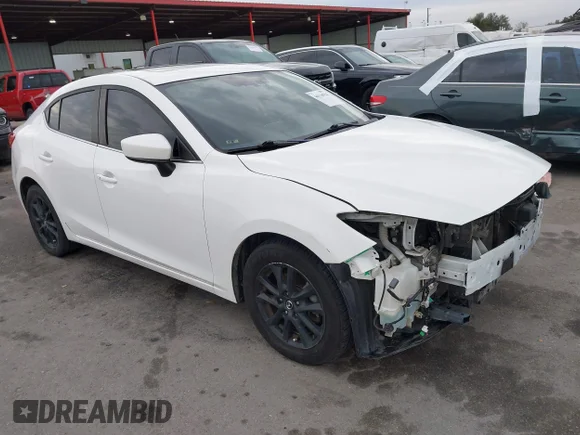 ✅ 2016 Mazda 3 i Touring • VIN: JM1BM1V7XG1318849 • Lot: 44116934. Listed on IAAI with 141,981 mi. Free auction sales archive from the USA and detailed vehicle history report at DreamBid. Image 1.