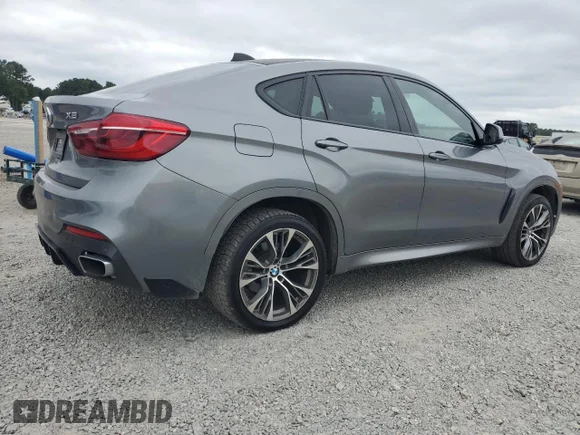 ✅ 2018 BMW X6 xDrive35i • VIN: 5UXKU2C50J0X48621 • Лот: 69807185. Опубліковано раніше на Copart з пробігом 176 285 миль. Безкоштовний доступ до архіву аукціонних продажів зі США та докладний звіт про історію автомобіля на DreamBid. Зображення 3.