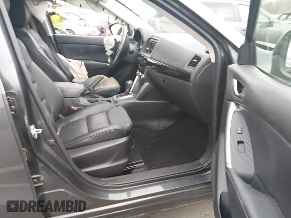 ✅ 2015 Mazda CX-5 Grand Touring • VIN: JM3KE4DY2F0434292 • Lot: 44152994. Listed on IAAI with Not provided. Free auction sales archive from the USA and detailed vehicle history report at DreamBid. Image 5.