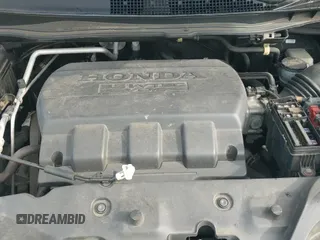 ✅ 2015 Honda Odyssey Touring Elite • VIN: 5FNRL5H9XFB041101 • Лот: 43063363. Опубликован ранее на IAAI с пробегом 162 011 миль. Бесплатный доступ к архиву аукционных продаж из США и подробный отчёт об истории автомобиля на DreamBid. Изображение 20.