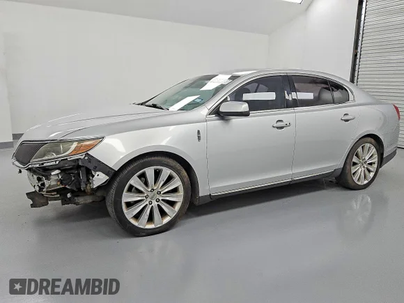 ✅ 2015 Lincoln MKS EcoBoost • VIN: 1LNHL9FT1FG607990 • Lot: 51817836. Listed on Copart with 157,364 mi. Free auction sales archive from the USA and detailed vehicle history report at DreamBid. Image 1.