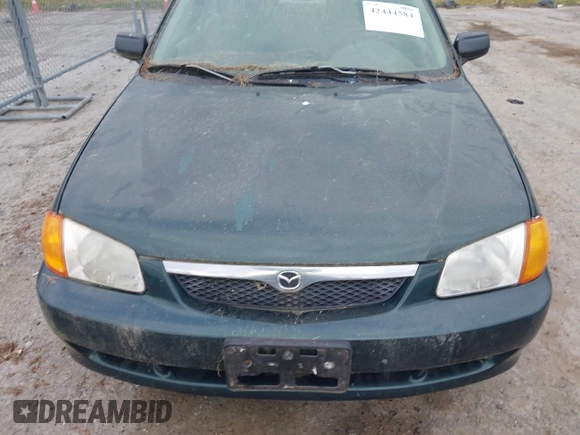 ✅ 1999 Mazda Protege DX • VIN: JM1BJ2222X0151674 • Lot: 42444584. Wystawiony na IAAI z przebiegiem 219 862 mil. Bezpłatny archiwum sprzedaży aukcyjnych z USA i szczegółowy raport historii pojazdu na DreamBid. Zdjęcie 6.