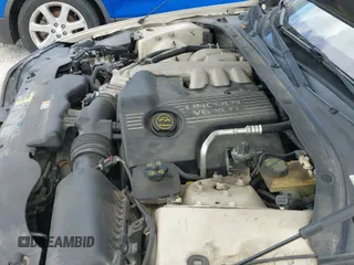 ✅ 2003 Lincoln LS • VIN: 1LNHM86S13Y684251 • Lot: 43053378. Listed on IAAI with 100,329 mi. Free auction sales archive from the USA and detailed vehicle history report at DreamBid. Image 12.