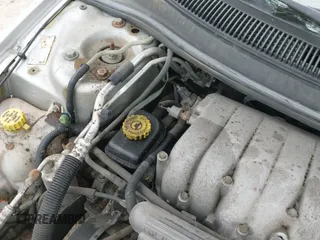 ✅ 2000 Chrysler Cirrus LXi • VIN: 1C3EJ56H9YN111856 • Lot: 42353170. Wystawiony na IAAI z przebiegiem 143 009 mil. Bezpłatny archiwum sprzedaży aukcyjnych z USA i szczegółowy raport historii pojazdu na DreamBid. Zdjęcie 18.