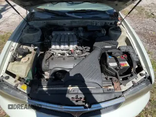 ✅ 2000 Mitsubishi Diamante LS • VIN: 6MMAP67P4YT001142 • Lot: 49667135. Wystawiony na Copart z przebiegiem 243 861 mil. Bezpłatny archiwum sprzedaży aukcyjnych z USA i szczegółowy raport historii pojazdu na DreamBid. Zdjęcie 11.