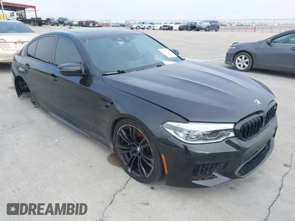 ✅ 2019 BMW M5 • VIN: WBSJF0C51KB447804 • Lot: 41848760. Wystawiony na IAAI z przebiegiem 83 303 mil. Bezpłatny archiwum sprzedaży aukcyjnych z USA i szczegółowy raport historii pojazdu na DreamBid. Zdjęcie 1.
