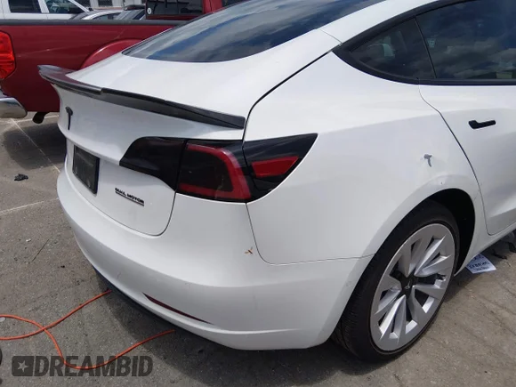 ✅ 2022 Tesla Model 3 Long Range • VIN: 5YJ3E1EB9NF123996 • Lot: 45223352. Listed on IAAI with 55,633 mi. Free auction sales archive from the USA and detailed vehicle history report at DreamBid. Image 6.