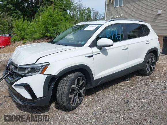 ✅ 2022 Volkswagen Taos SEL • VIN: 3VV2X7B22NM085702 • Lot: 45196976. Wystawiony na IAAI z przebiegiem 43 132 mil. Bezpłatny archiwum sprzedaży aukcyjnych z USA i szczegółowy raport historii pojazdu na DreamBid. Zdjęcie 2.