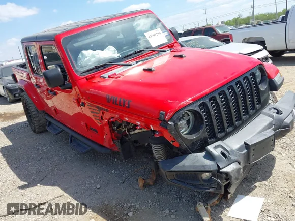 ✅ 2022 Jeep Gladiator Willys • VIN: 1C6HJTAG2NL176977 • Lot: 44709290. Listed on IAAI with 46,654 mi. Free auction sales archive from the USA and detailed vehicle history report at DreamBid. Image 1.