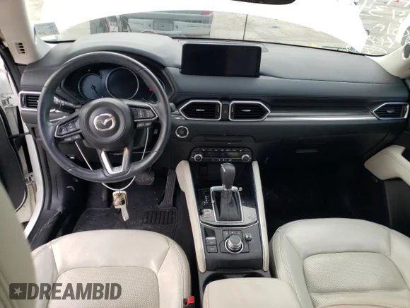 ✅ 2021 Mazda CX-5 Grand Touring • VIN: JM3KFADM1M1373436 • Лот: 73589792. Опубліковано раніше на Copart з пробігом 12 320 миль. Безкоштовний доступ до архіву аукціонних продажів зі США та докладний звіт про історію автомобіля на DreamBid. Зображення 8.