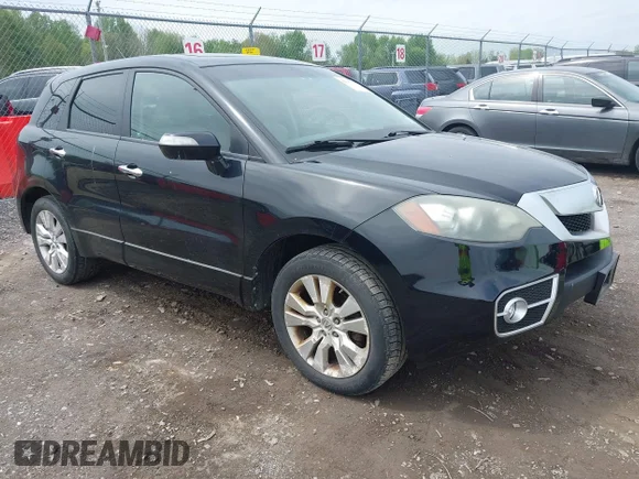 ✅ 2012 Acura RDX • VIN: 5J8TB1H20CA000664 • Лот: 44110015. Опубліковано раніше на IAAI з пробігом 213 044 миль. Безкоштовний доступ до архіву аукціонних продажів зі США та докладний звіт про історію автомобіля на DreamBid. Зображення 1.